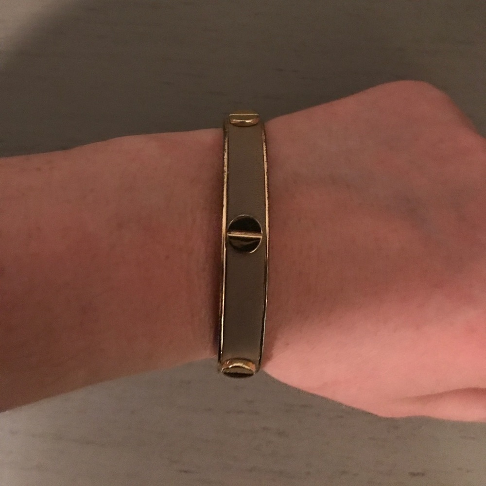 C. Wonder Beige leather and gold bangle